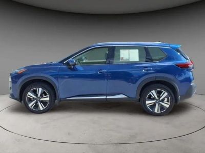 2023 Nissan Rogue SL in Caspian Blue Metallic — front three-quarter view