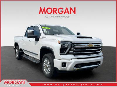 2025 Chevrolet Silverado 2500HD High Country in Beige — front three-quarter view