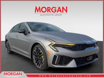 2026 Kia K5 GT in Steel Matte Gray — front three-quarter view