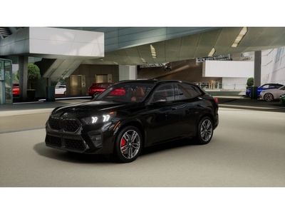 2026 BMW X2 xDrive28i in Black Sapphire Metallic — front three-quarter view