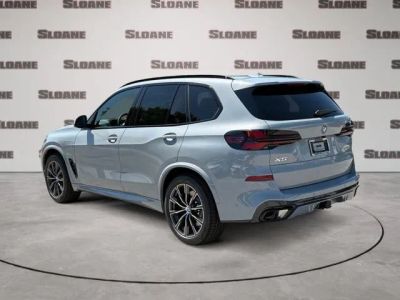 2026 BMW X5 — rear three-quarter view