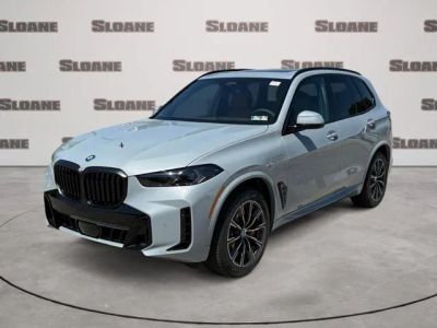 2026 BMW X5 xDrive50e in Brooklyn Grey Metallic — front three-quarter view