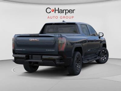 2026 GMC Sierra EV — rear three-quarter view
