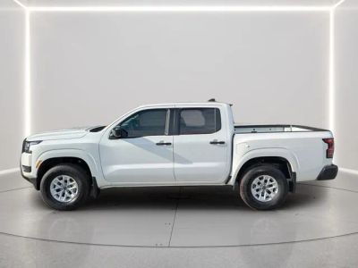 2026 Nissan Frontier — rear three-quarter view