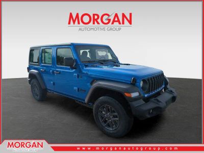 2026 Jeep Wrangler Sport in Blue — front three-quarter view