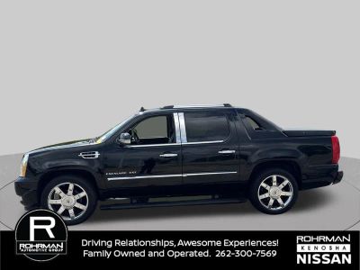 2011 Cadillac Escalade EXT — side profile view