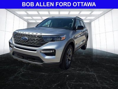 2024 Ford Explorer XLT in Iconic Silver — front three-quarter view