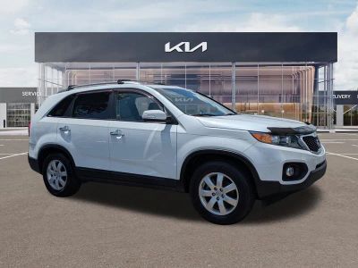 2012 Kia Sorento LX in Snow White Pearl — front three-quarter view