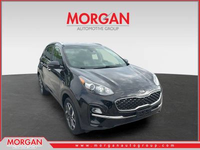 2020 Kia Sportage EX in Black Cherry Pearl — front three-quarter view