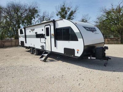 2024 Forest River RV Wildwood X-Lite — front three-quarter view