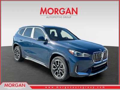 2026 BMW X1 xDrive28i in Blue — front three-quarter view
