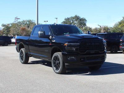 2026 RAM 2500 Laramie in Diamond Black Crystal Pearl-Coat Exterior Paint — front three-quarter view