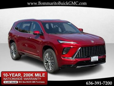 2026 Buick Enclave Avenir in Cherry Red Tintcoat — front three-quarter view