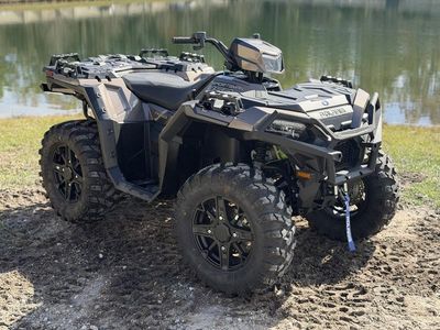 2026 Polaris Sportsman 850 Trail in BRZ — front three-quarter view