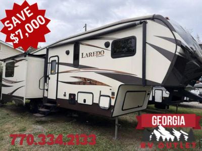 2014 Keystone Laredo 295SCK — front three-quarter view