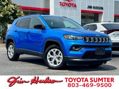 2024 Jeep Compass Latitude in Hydro Blue Pearlcoat — front three-quarter view
