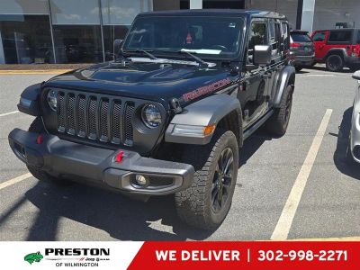 2022 Jeep Wrangler Unlimited Rubicon in Black Clearcoat — front three-quarter view