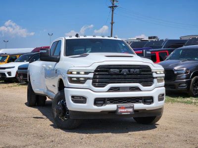 2026 RAM 3500 RAM 3500 LARAMIE CREW CAB 4X4 8' BOX in Bright White Clear-Coat Exterior Paint — front three-quarter view