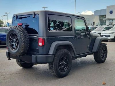 2016 Jeep Wrangler — rear three-quarter view