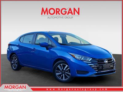 2024 Nissan Versa 1.6 SV in Blue — front three-quarter view