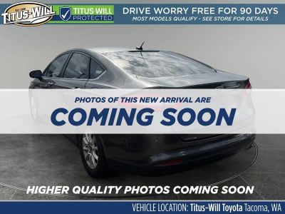 2016 Ford Fusion — rear three-quarter view