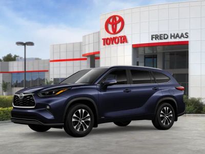 2026 Toyota Highlander Hybrid — rear three-quarter view