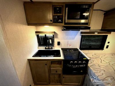 2027 Sunset Park RV Sun Lite — engine compartment view