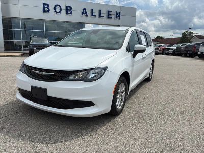 2023 Chrysler Voyager LX in Bright White Clear Coat — front three-quarter view