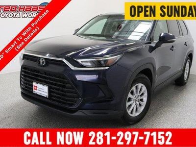 2025 Toyota Grand Highlander FWD XLE 2.4T in Blueprint — front three-quarter view