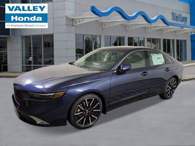 2026 Honda Accord Hybrid Touring in Canyon River Blue Metallic — front three-quarter view