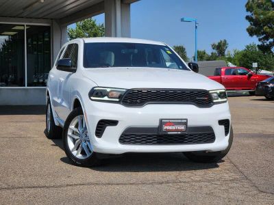 2025 Dodge Durango GT AWD in White Knuckle Clearcoat — front three-quarter view