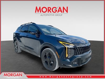 2026 Kia Sportage Plug-In Hybrid X-Line Prestige in Vesta Blue — front three-quarter view