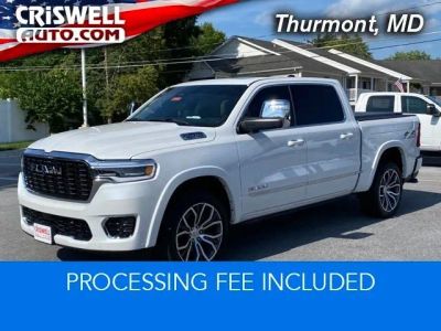 2025 RAM 1500 Tungsten Crew Cab 4x4 5'7' Box in Ivory White Tri-Coat Pearlcoat — front three-quarter view