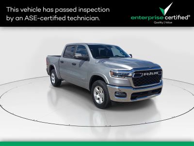 2025 Ram 1500 Big Horn 4x4 Crew Cab 5'7" Box — front three-quarter view