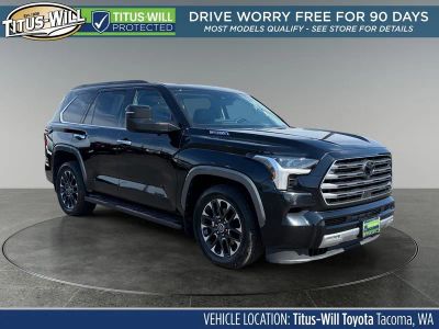 2023 Toyota Sequoia Limited in Midnight Black Metal — front three-quarter view