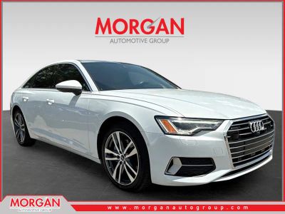 2023 Audi A6 Sedan Premium Plus in Glacier White — front three-quarter view