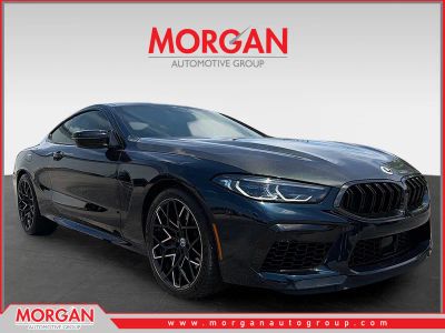 2023 BMW M8 Competition in Petrol Mica Metallic — front three-quarter view