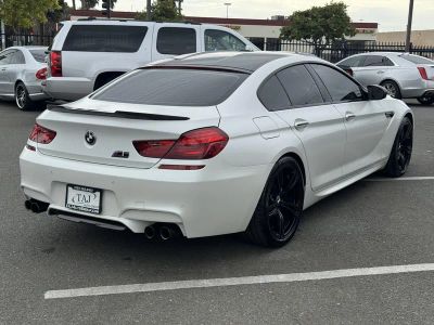 2015 BMW M6 — rear three-quarter view