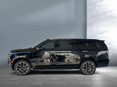 2026 Chevrolet Suburban — rear three-quarter view