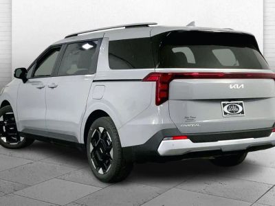 2026 Kia Carnival — rear three-quarter view