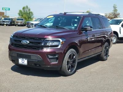 2023 Ford Expedition Limited in Red Metallic — front three-quarter view