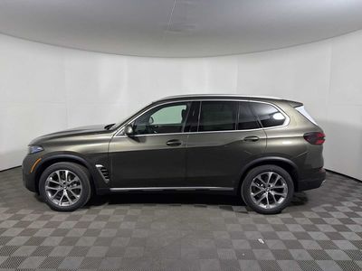 2026 BMW X5 xDrive40i — rear three-quarter view