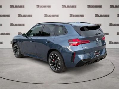 2026 BMW X3 — rear three-quarter view