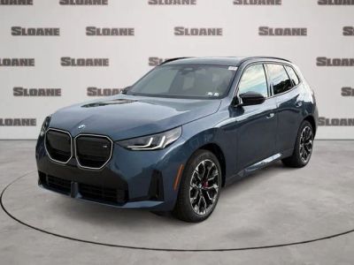 2026 BMW X3 M50 xDrive in Arctic Race Blue Metallic — front three-quarter view