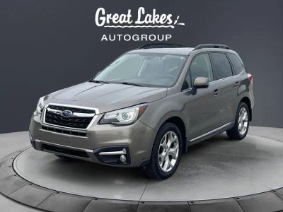 2018 Subaru Forester 2.5i Touring in Sepia Bronze Metallic — front three-quarter view