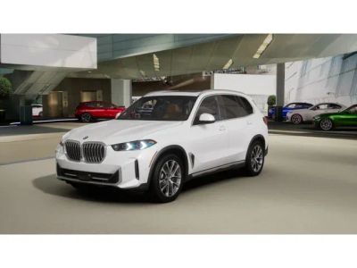 2026 BMW X5 xDrive40i in Mineral White Metallic — front three-quarter view