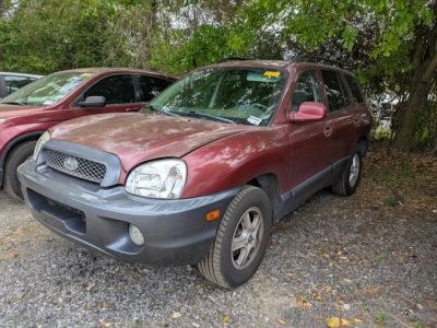 2003 Hyundai Santa Fe GLS in Red — front three-quarter view