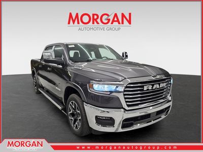 2026 Ram 1500 Laramie in Granite Crystal Metallic Clearcoat — front three-quarter view