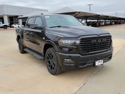 2026 RAM 1500 Laramie in Diamond Black Crystal Pearlcoat — front three-quarter view