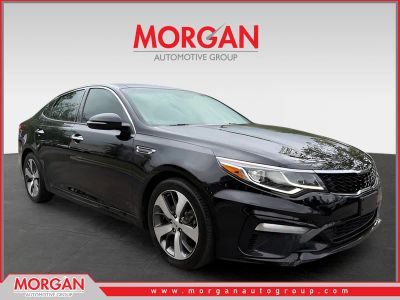 2019 Kia Optima S in Black — front three-quarter view